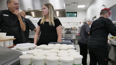 Prepping meals for Meals on Wheels. Photo: Mel Lefebvre