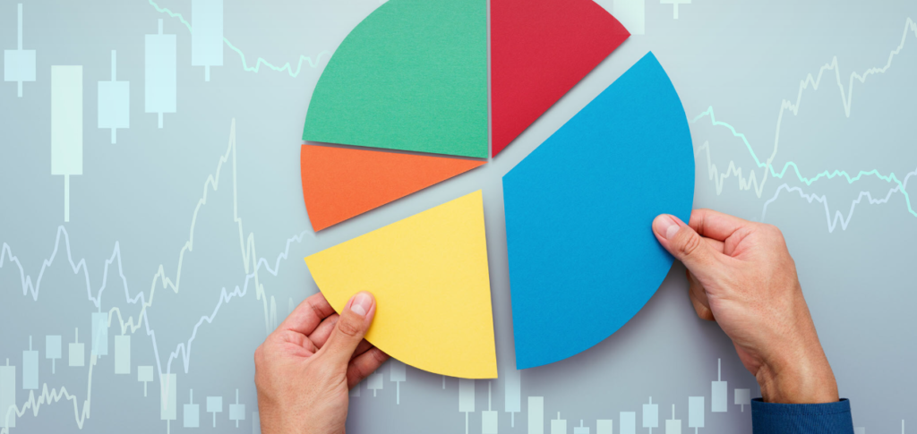 A pie chart with hands and a graph-background