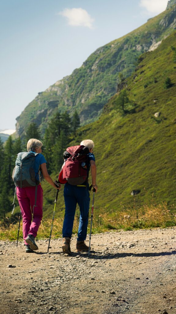 Seniors hiking with poles extends activity